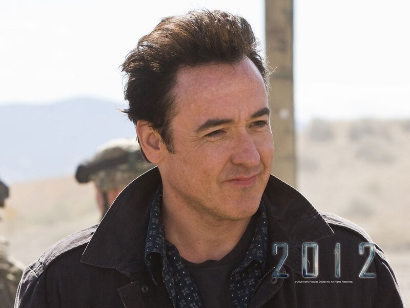 Man in Dark Jacket — Brown, Serious