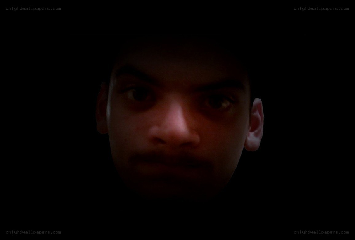 man in dark lighting