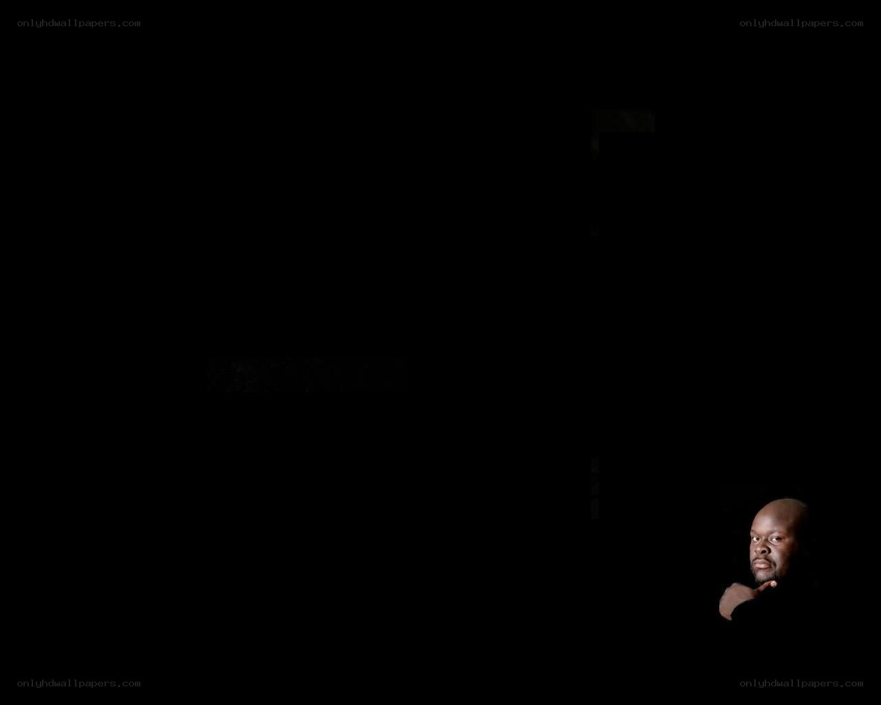 man in dark room