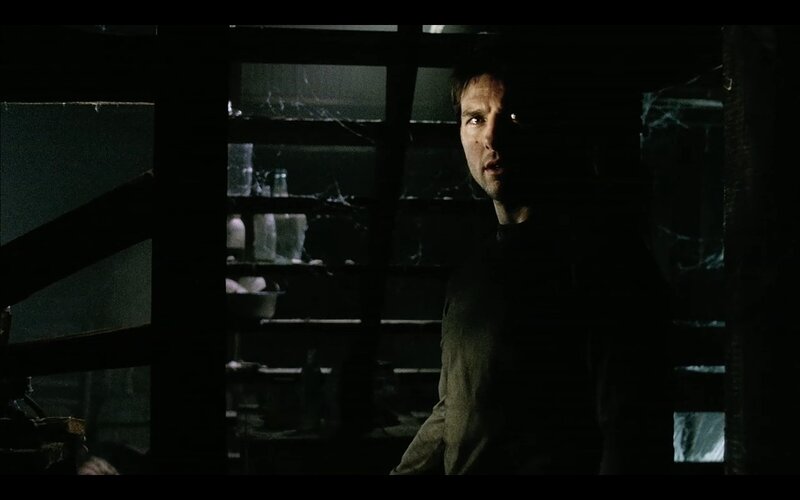 man in dark room