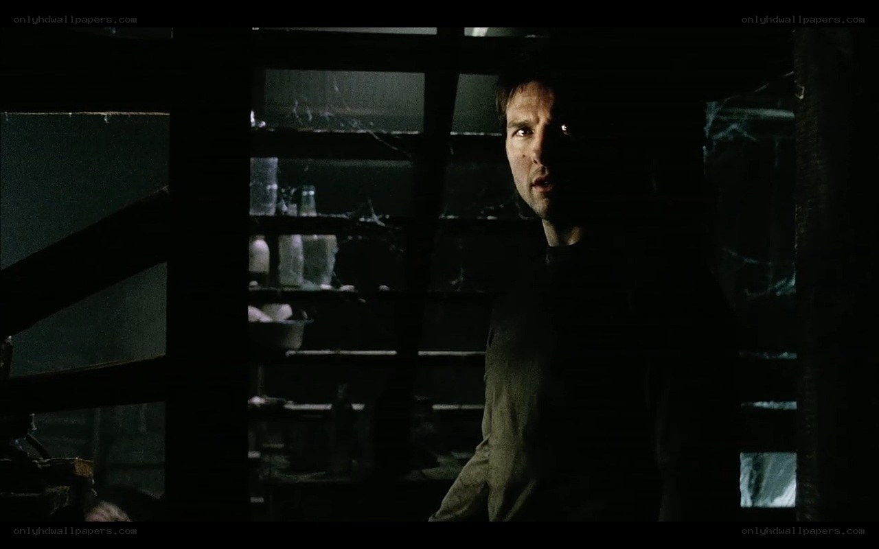 man in dark room