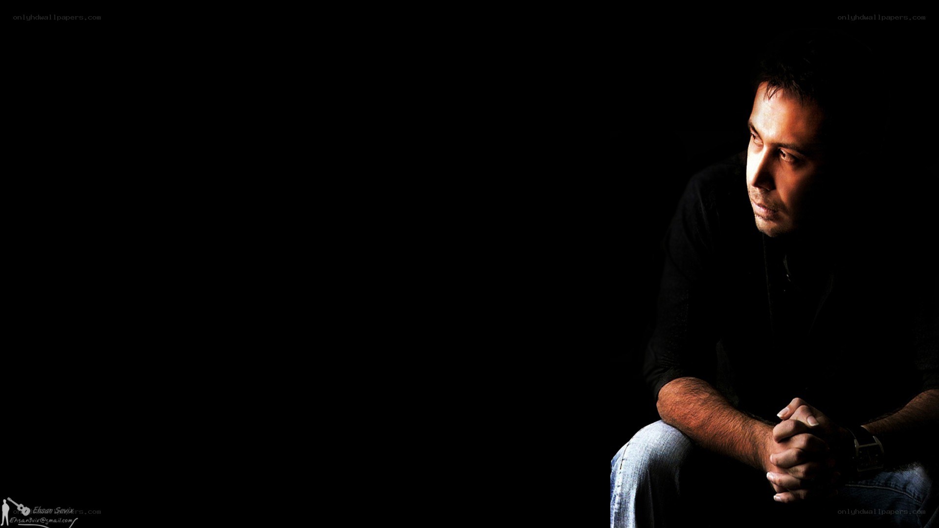 man in dark room