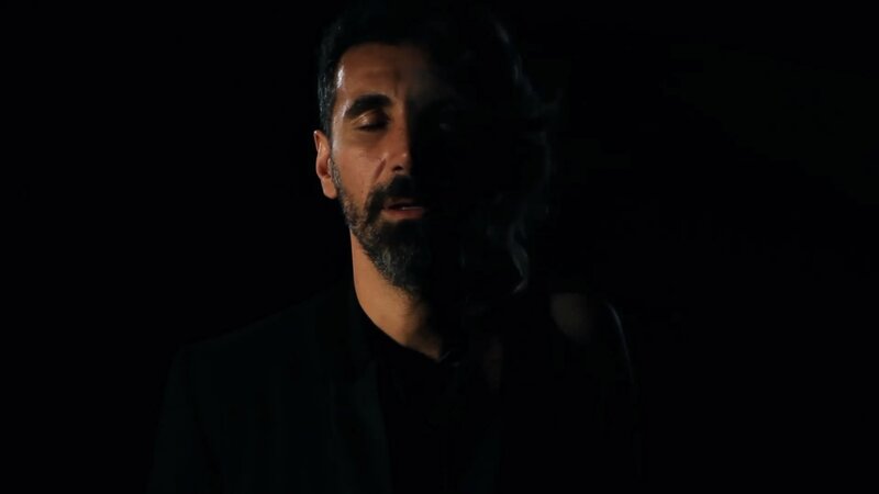 man in dark room