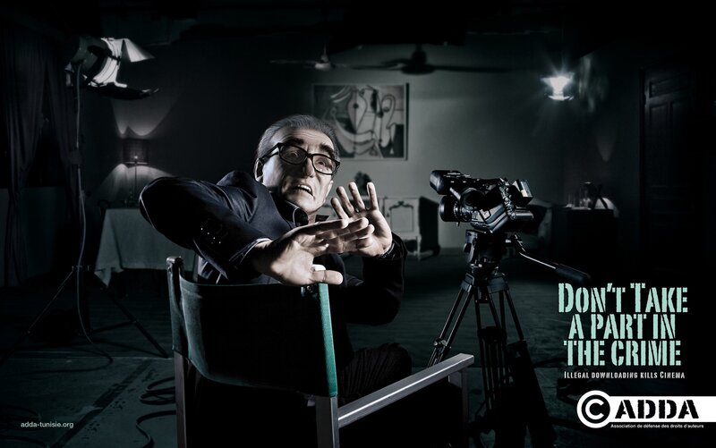 Man in dark room with camera