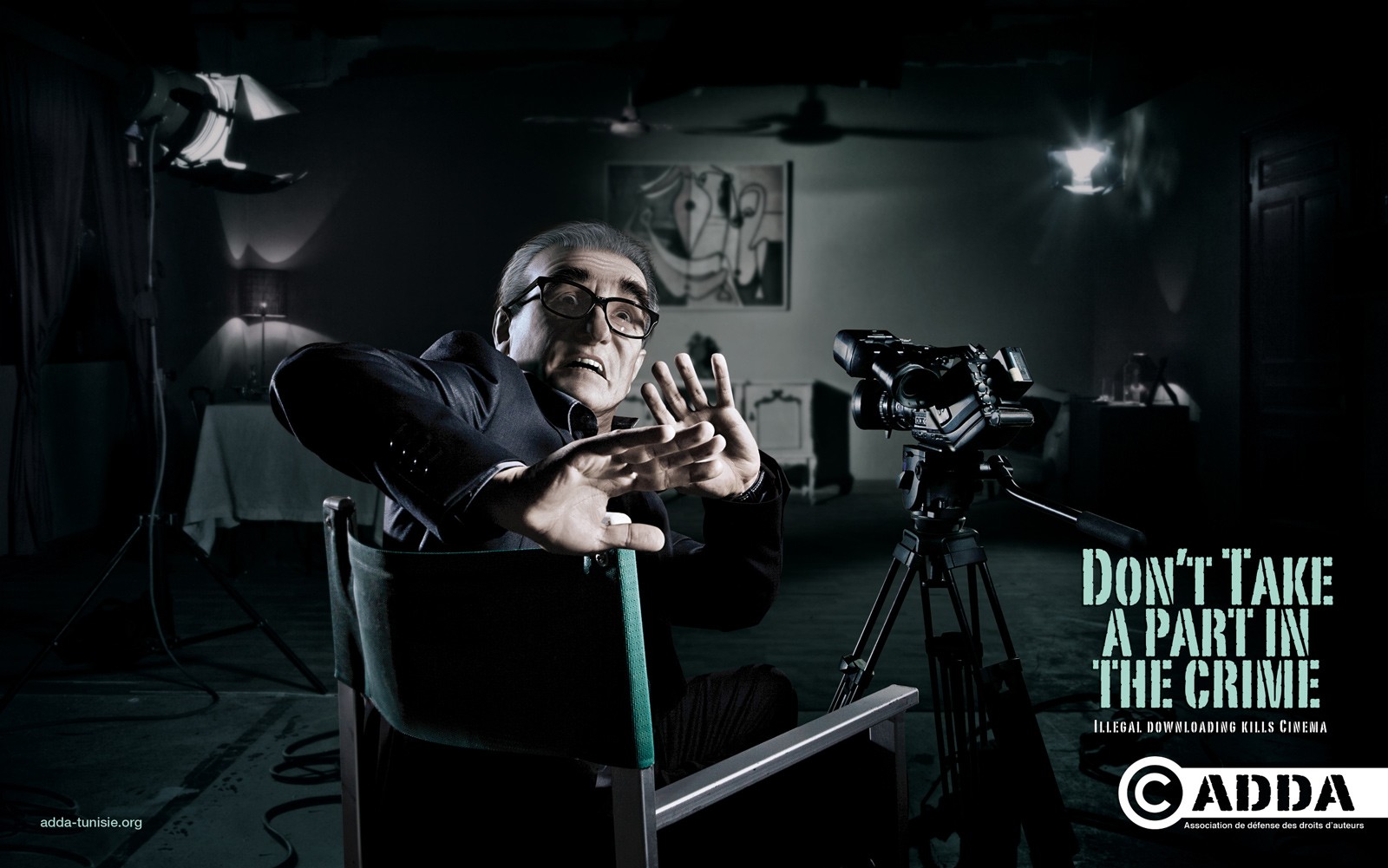Man in dark room with camera
