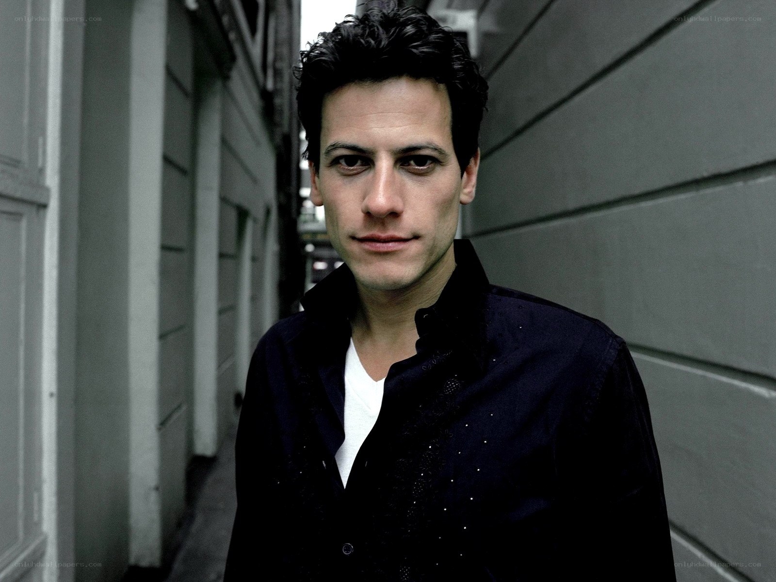 man in dark shirt in alley