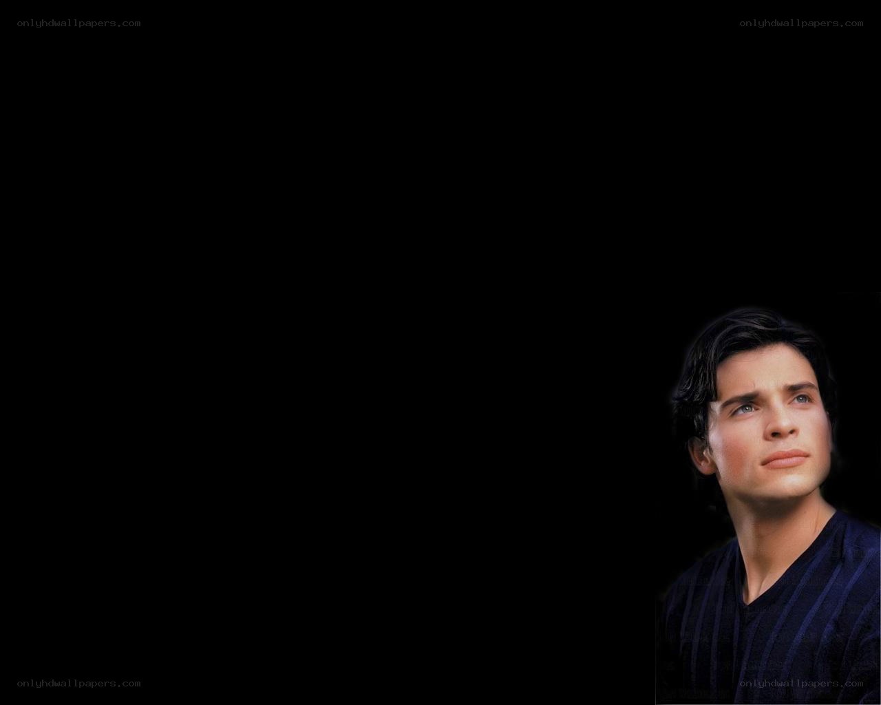 man in dark shirt looking up