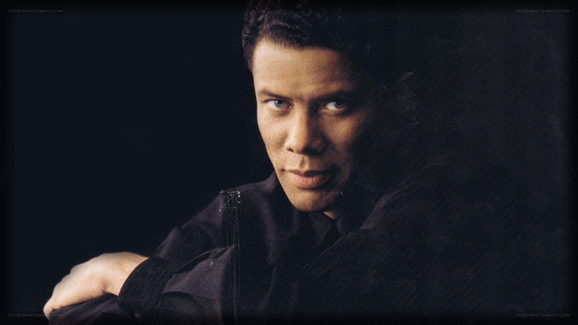 man in dark shirt portrait