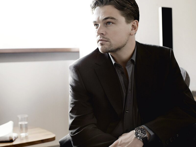 Man in Dark Suit — Black, Serious, Photograph, Watch, Table