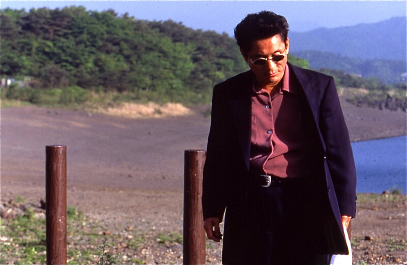 Man in Dark Suit — Blue, Serious, Afternoon