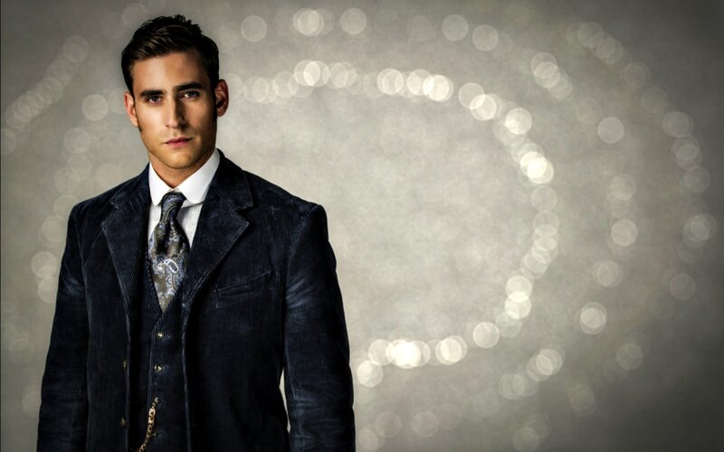 Man in Dark Suit — Gray, Dramatic