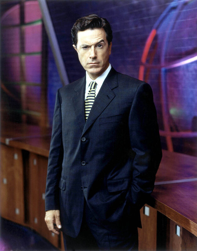 man in dark suit standing