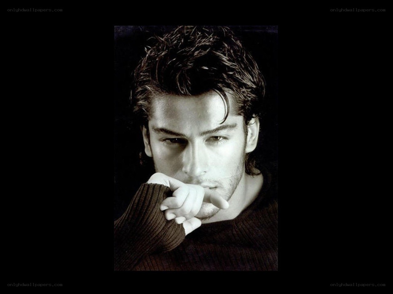 man in dark sweater
