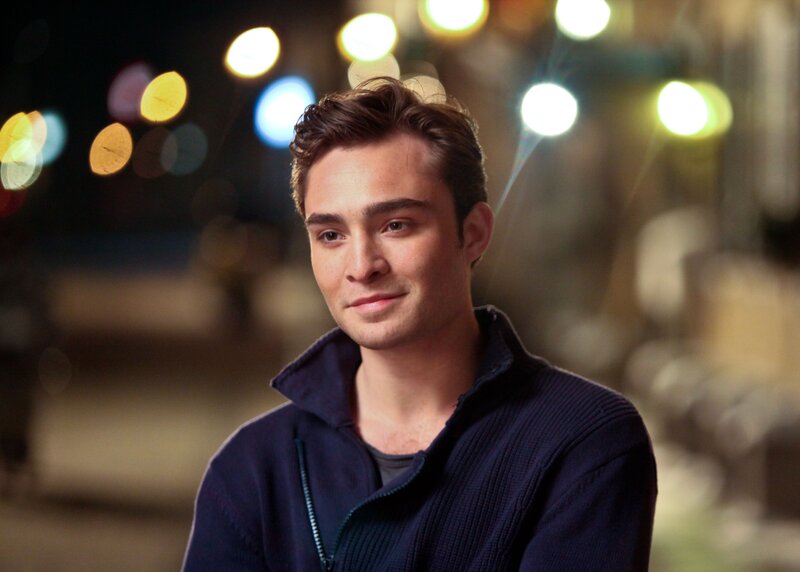 man in dark sweater at night