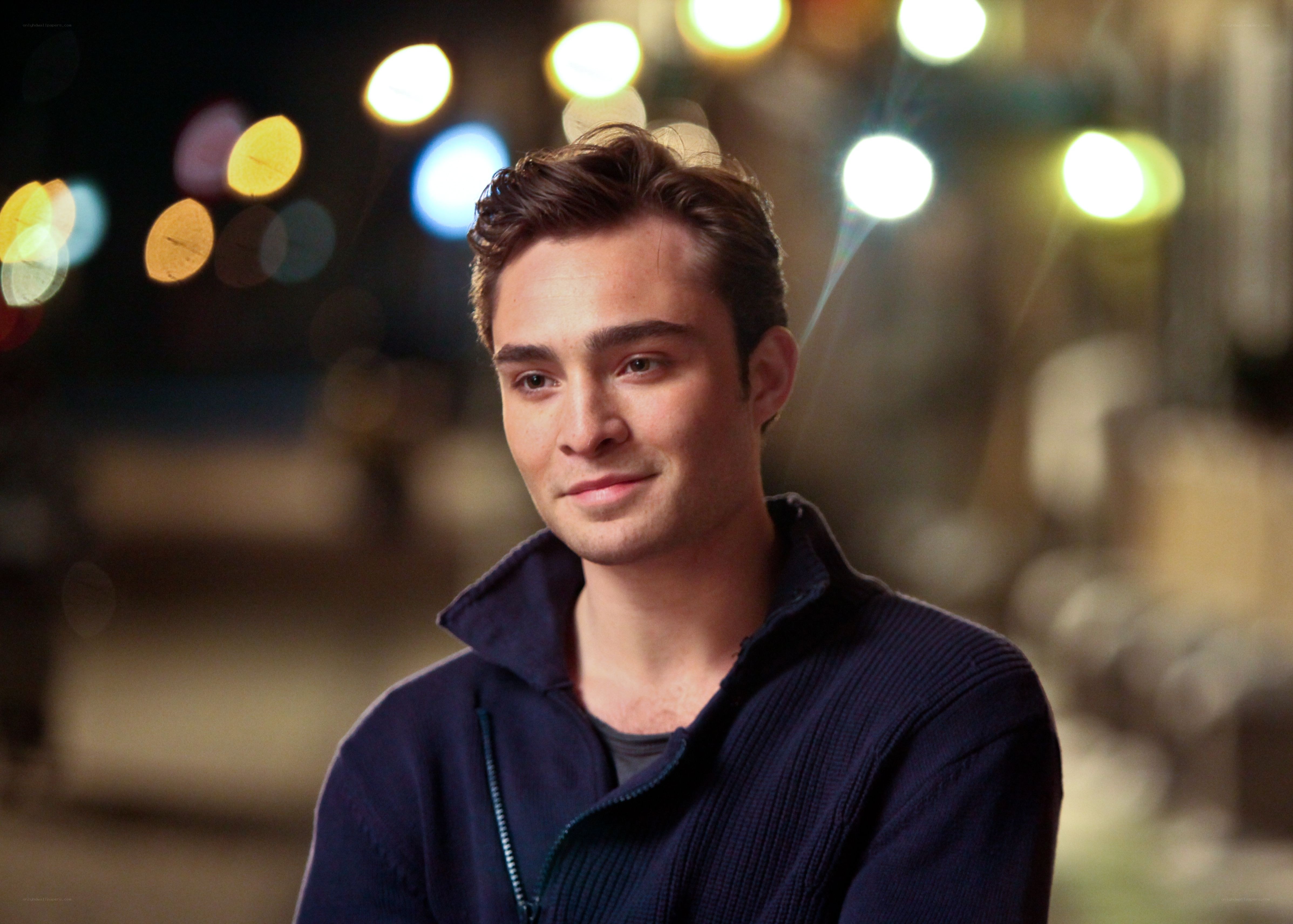 man in dark sweater at night