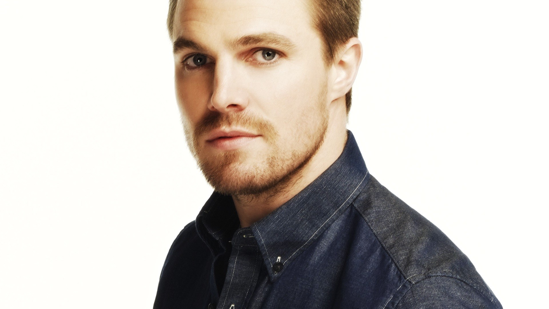 man in denim shirt