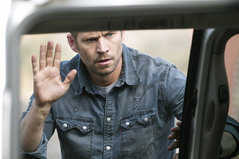 Man in Denim Shirt — Gray, Tense