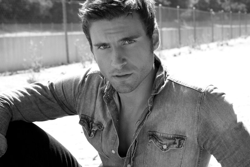 man in denim shirt outdoors