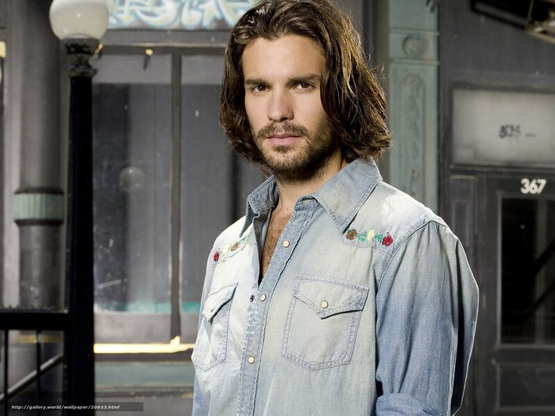 man in denim shirt