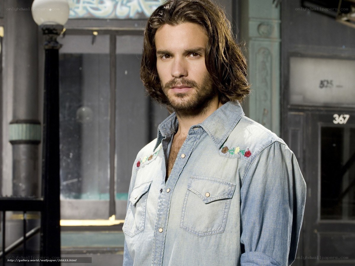 man in denim shirt