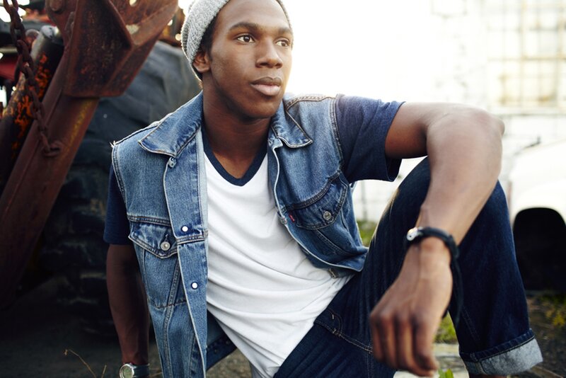 Man in Denim Vest