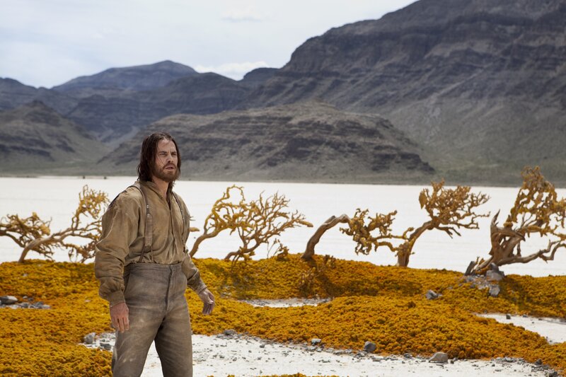 Man in Desert Landscape — Yellow