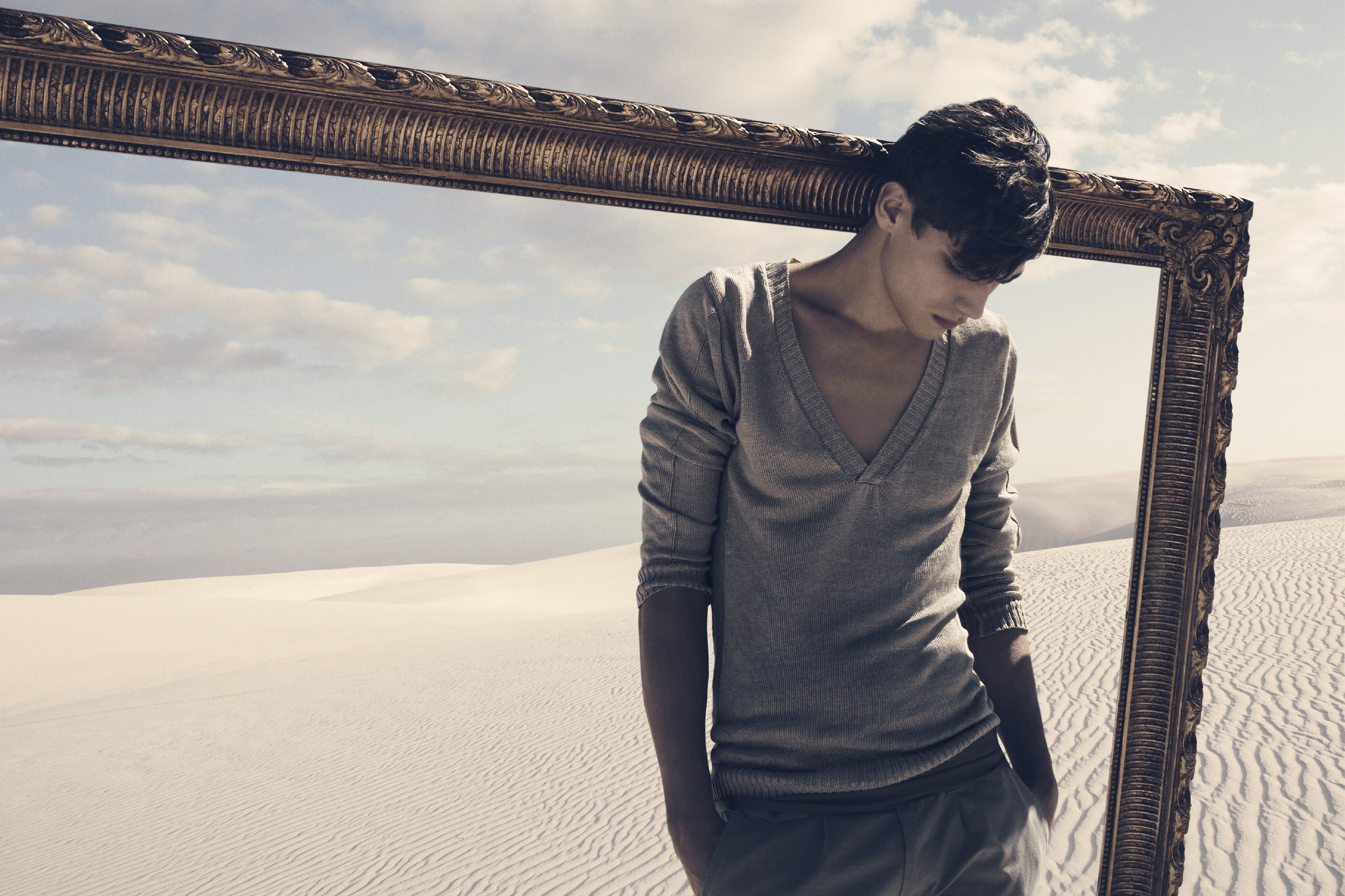 Man in desert with frame