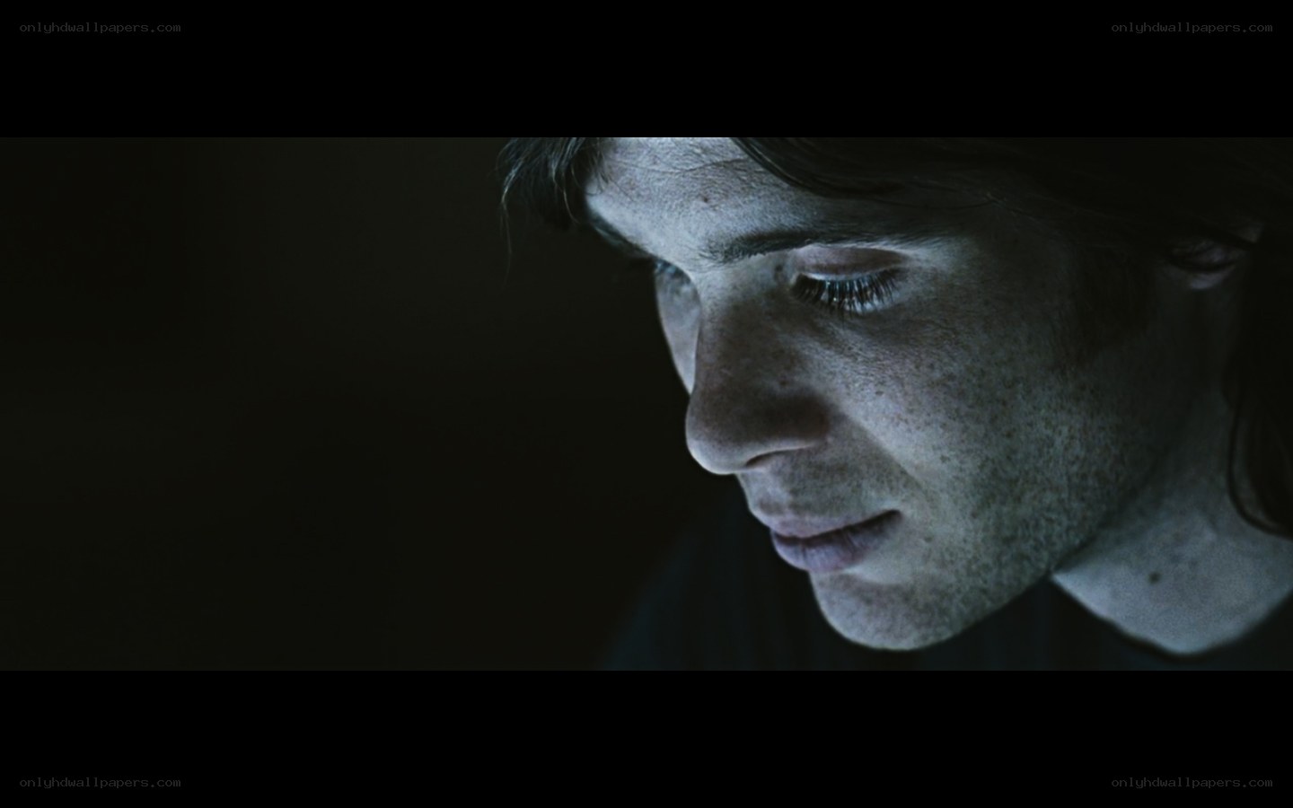 man in dim light