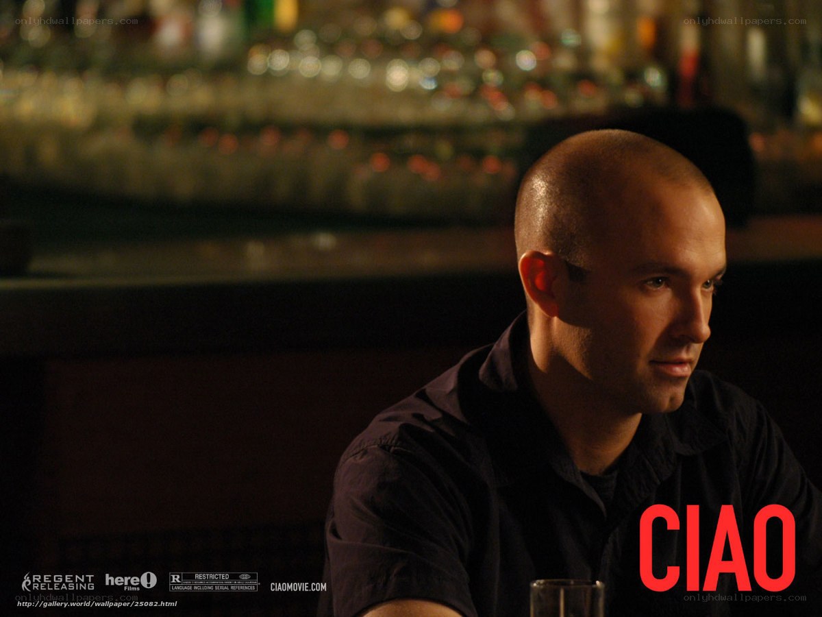 man in dimly lit bar