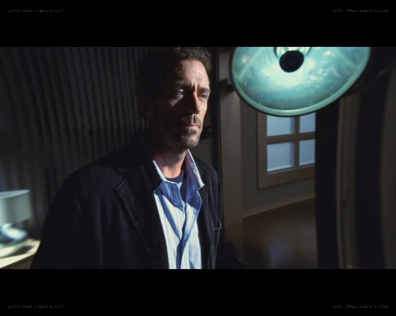 man in dimly lit room