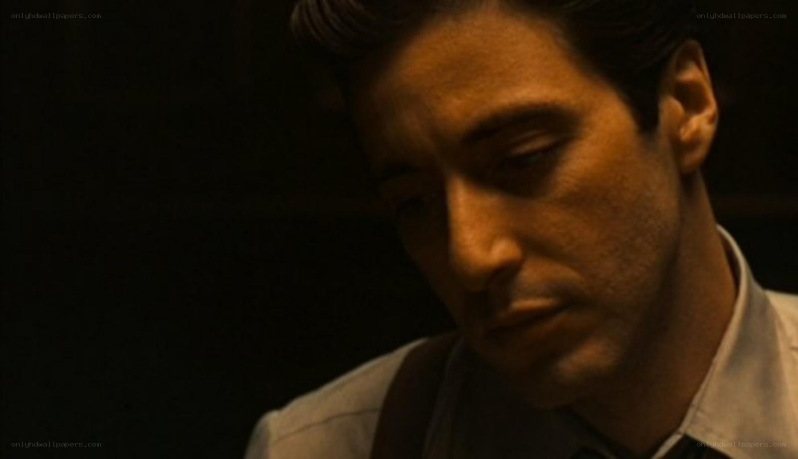 man in dimly lit room
