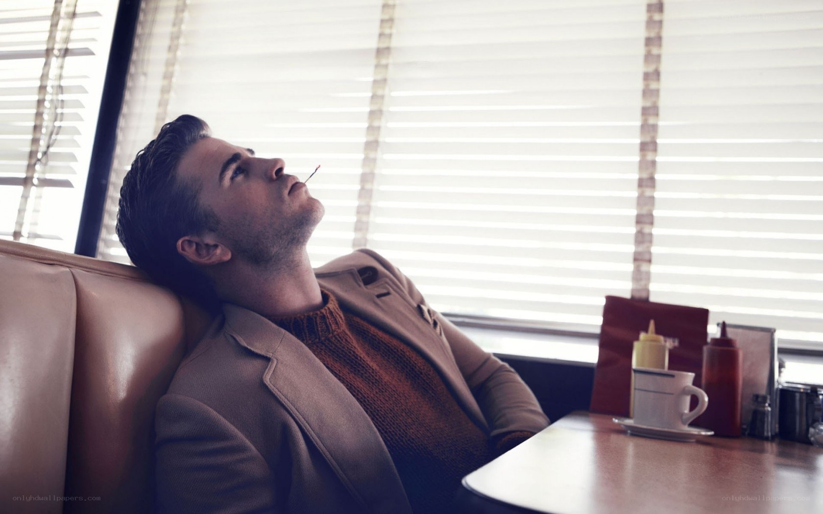 man in diner with cigarette