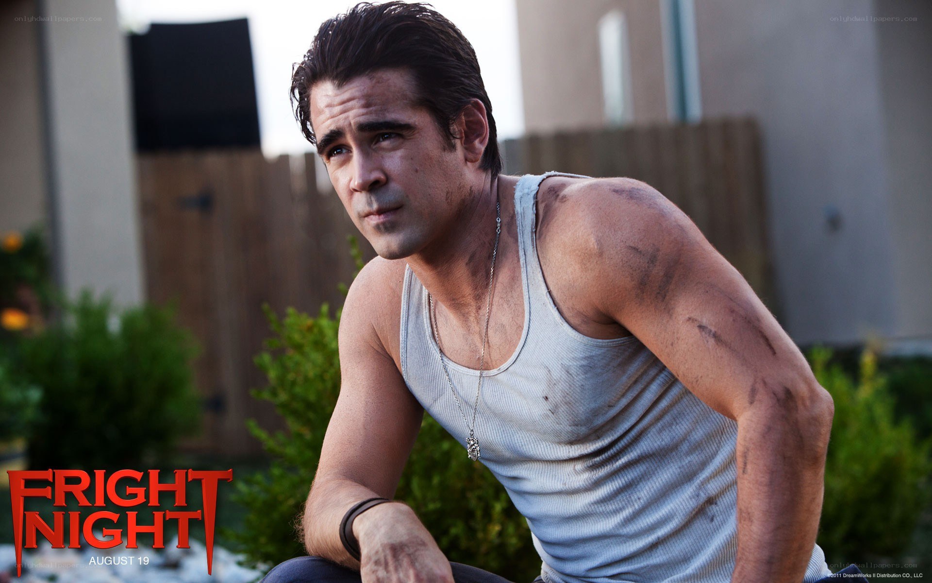 man in dirty tank top