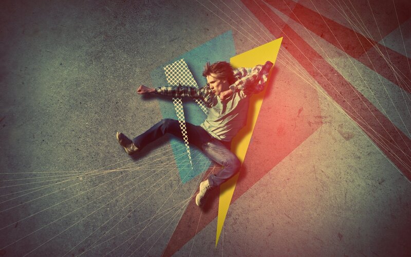 man in dynamic pose with geometric shapes