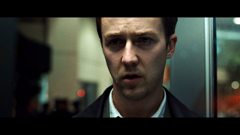 man in elevator looking concerned
