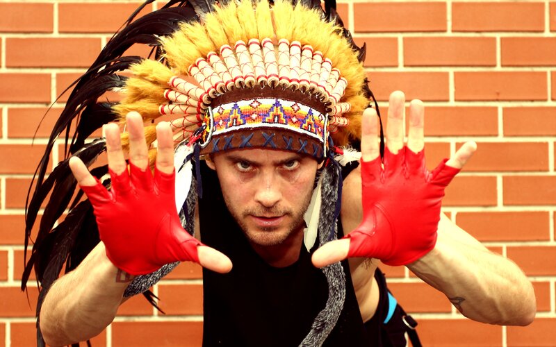 Man in Feather Headdress — Red