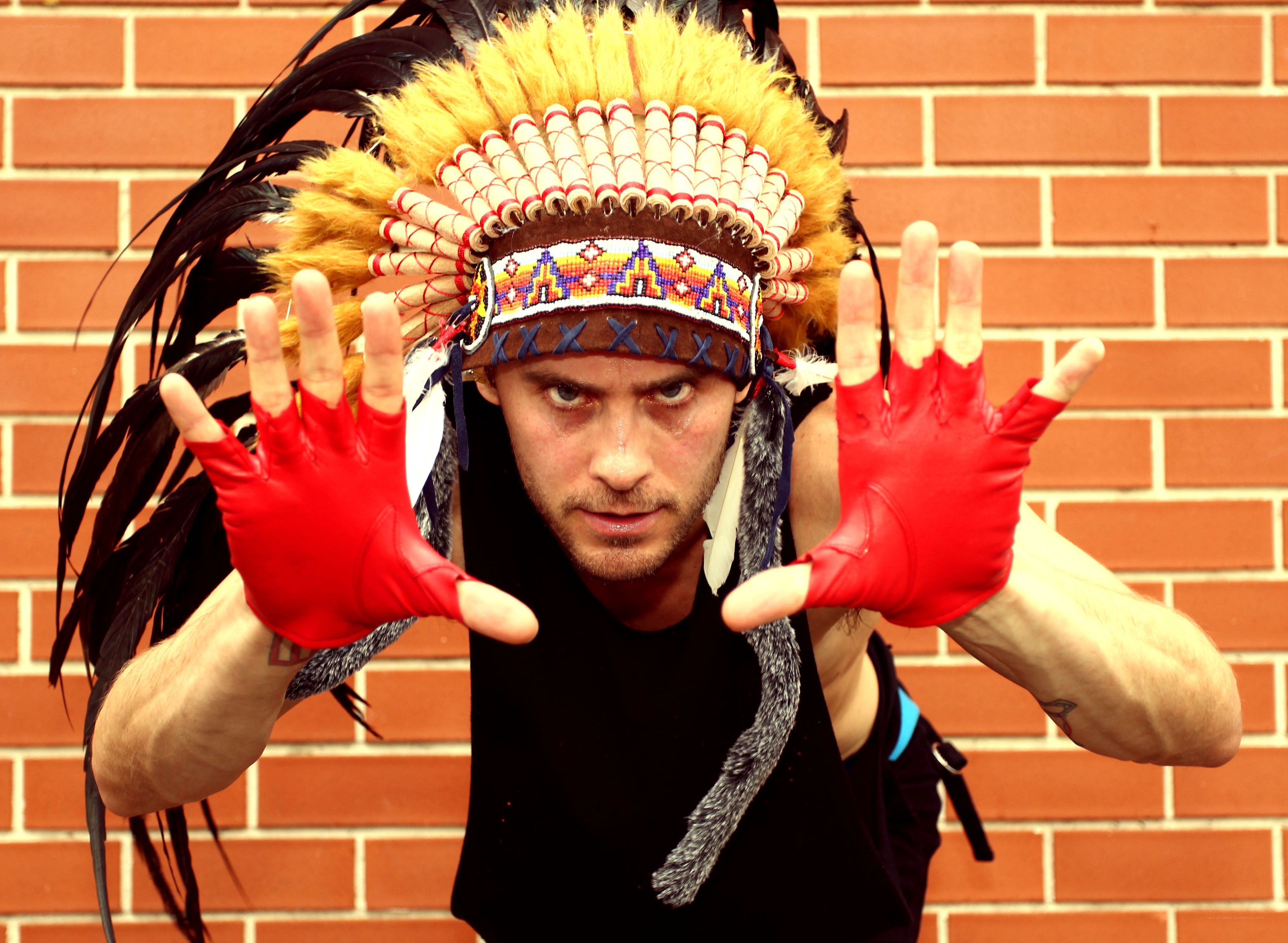 man in feather headdress