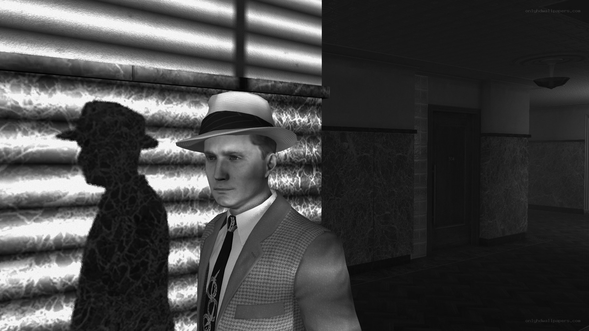 man in fedora and vest
