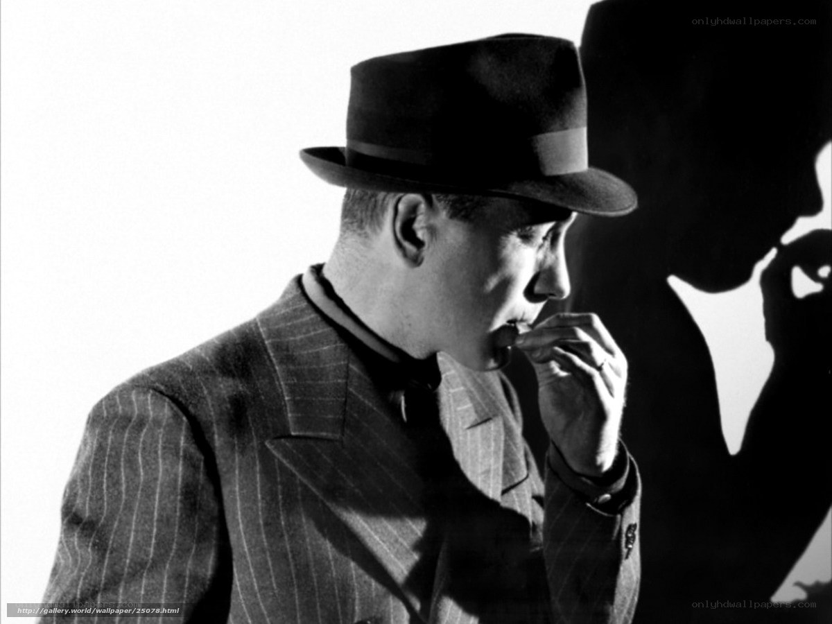 man in fedora smoking cigar
