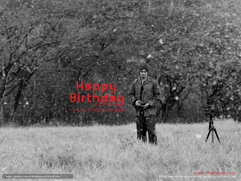 Man in field with camera