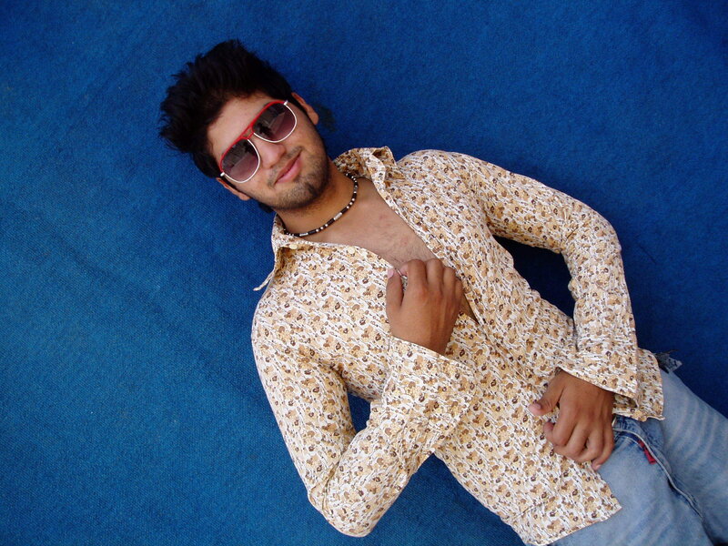 Man in floral shirt lying down