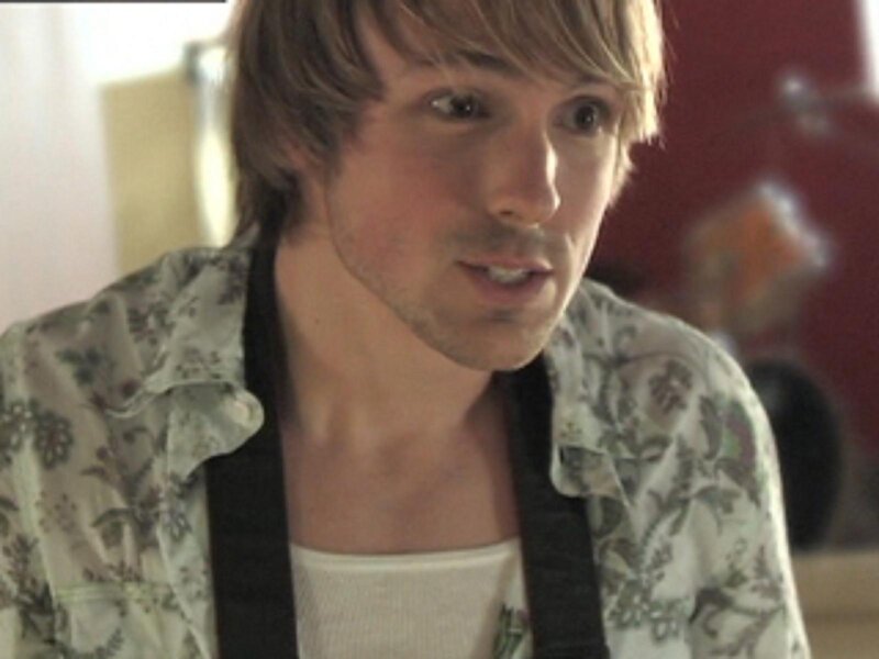 man in floral shirt