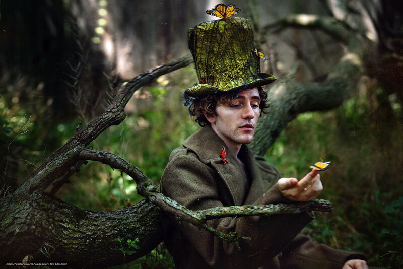 man in forest with butterflies