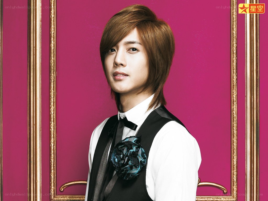 man in formal wear with flower