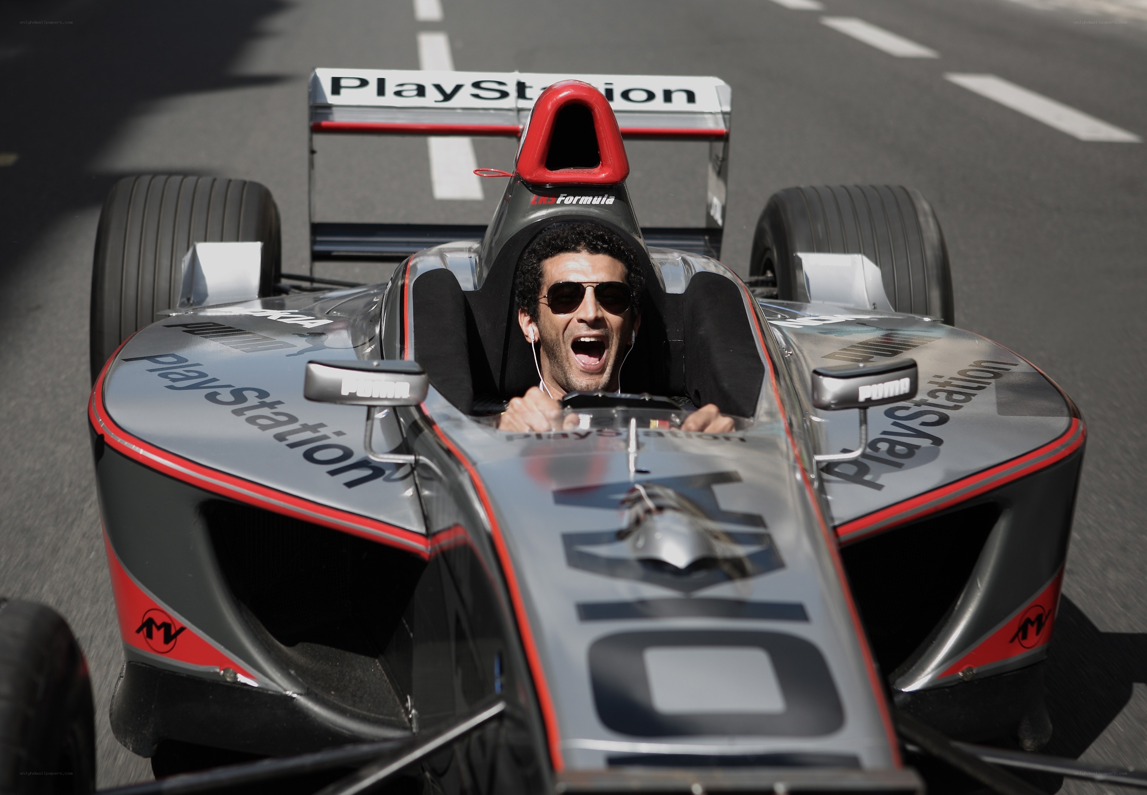 man in formula car