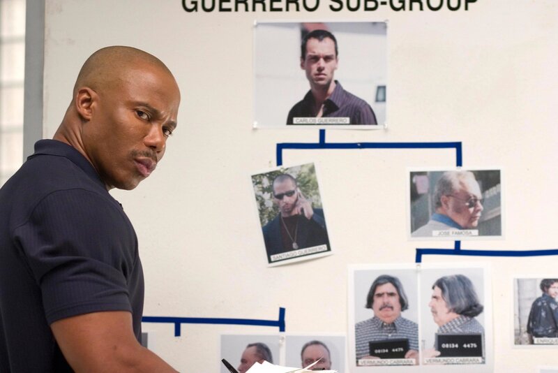 Man in front of criminal chart