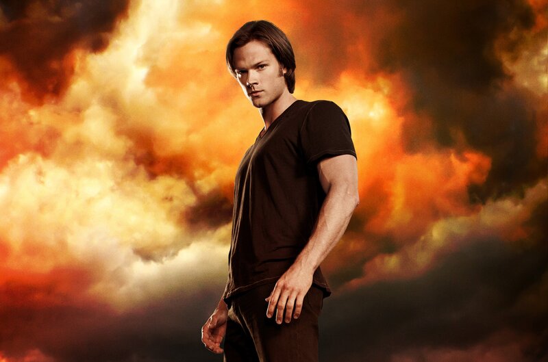 man in front of fiery sky