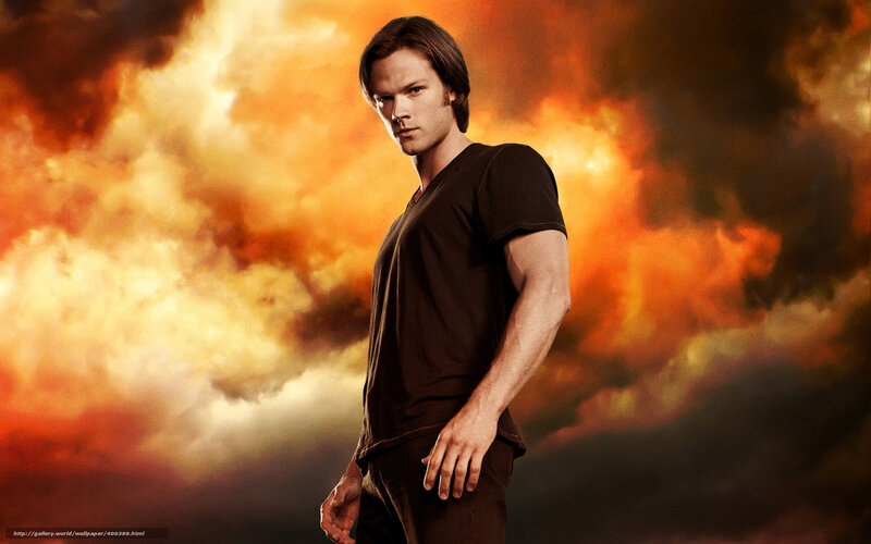 man in front of fiery sky