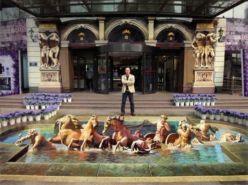 Man in Front of Fountain