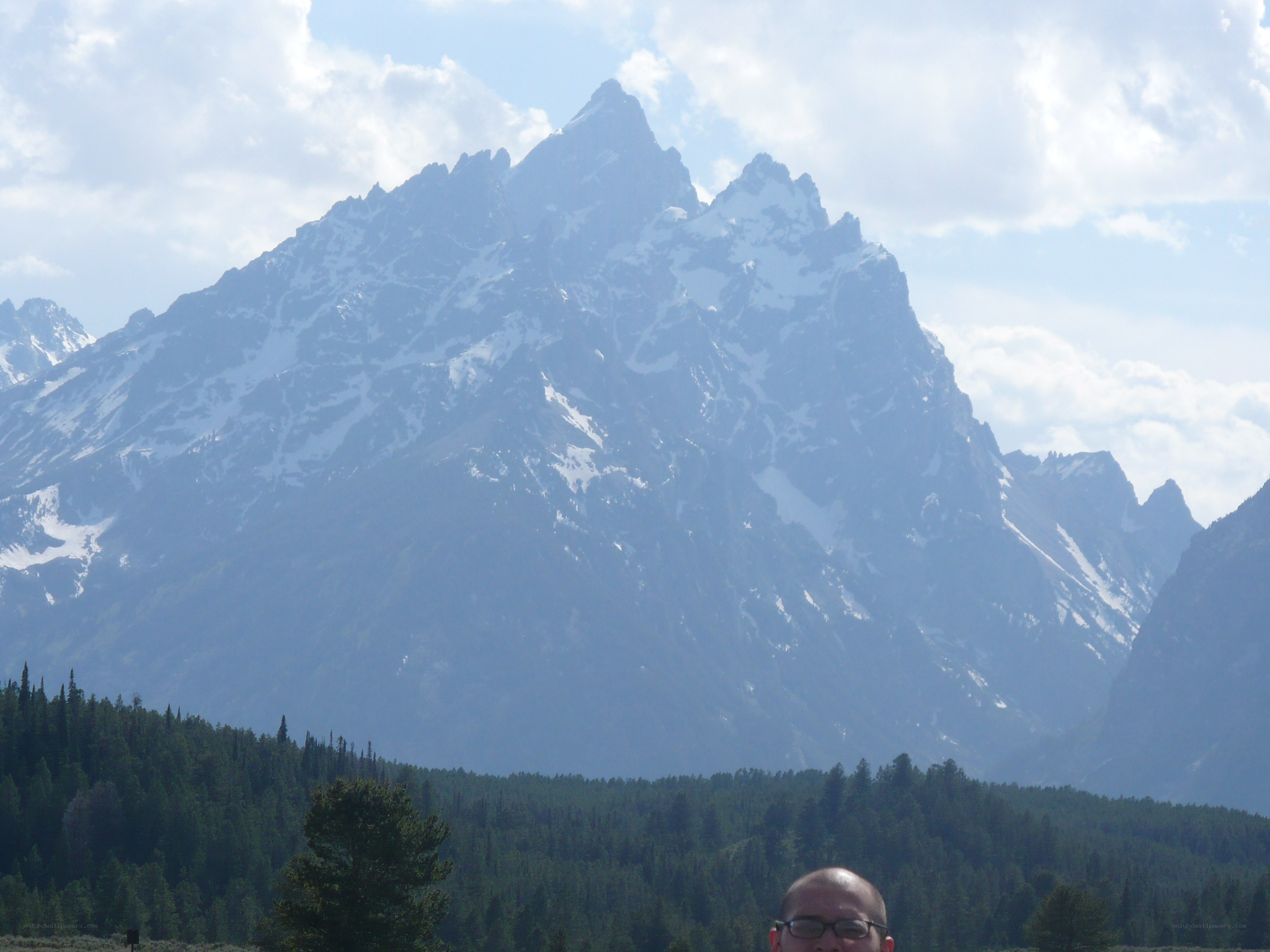 Man in front of mountain